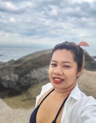 Smiling woman Asia at the beach Thailand