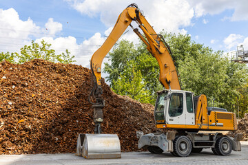 The mountain of scrap rusty metal waste