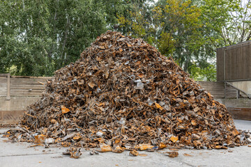 The mountain of scrap rusty metal waste