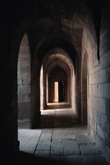 Ancient Stone Corridor with Arches and Light Emanating from Doorway