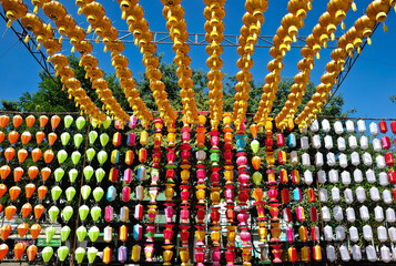 A collection of colorful paper lanterns, hanging in a festive arrangement