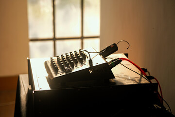 Illuminated sound mixing console in a studio