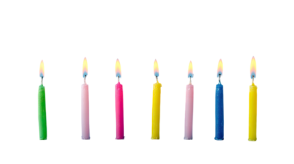 Colorful birthday candles against transparent background