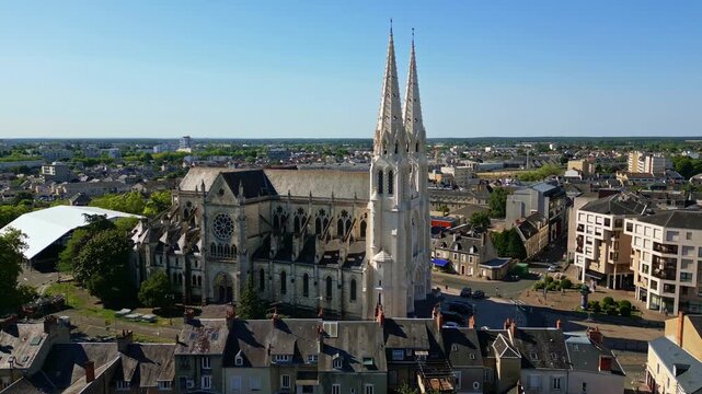Smooth approaching drone movement to the neo-gothic and beautiful Church of Saint-Andr&eacute; in Chateauroux, Chateauroux, Centre-Val de Loire, France.