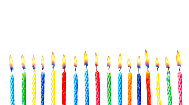 Colorful birthday candles in a horizontal row against a black background. Each candle has a vibrant, multicolored striped design and a flickering flame