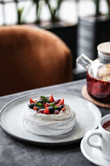 Indulge in a Delicious Pavlova Dessert that is beautifully topped