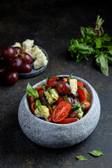 Enjoy a Fresh Salad with Juicy Tomatoes, Sweet Grapes, and