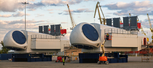 Wind turbine components during the assembly of a complete wind turbine nacelle