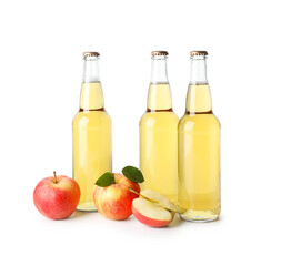Delicious cider in glass bottles and apples isolated on white