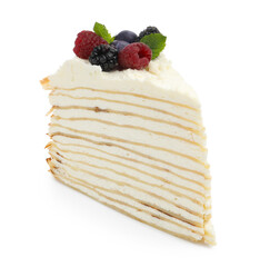 Piece of tasty crepe cake with berries and mint isolated on white
