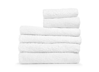 Stack of folded terry towels isolated on white