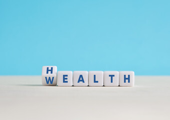Flipping a dice changing the word wealth into health. Health is the biggest wealth.