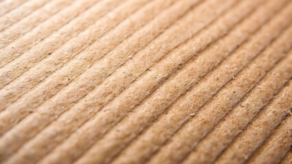 Close-up abstract view of diagonal ribbed textured surface with subtle speckles