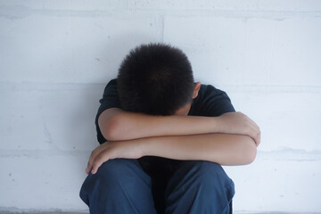 Stop abusing boy violence. child bondage , violence, terrified , A fearful child , Human Rights Day concept.	