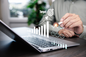 Targeting the business and human concept, Businessman holding arrow dart to virtual target dart board,Executive marketing, investment goal and target for business investment concept.