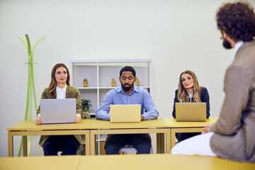 Group Interview Panel with Professionals Engaging During Business Discussion