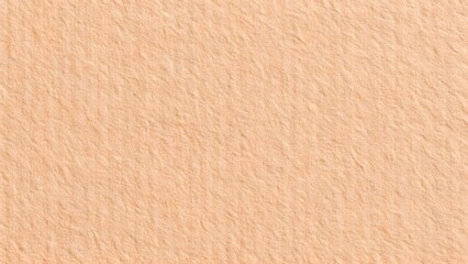 Close-up textured surface of light peach-colored corrugated cardboard material