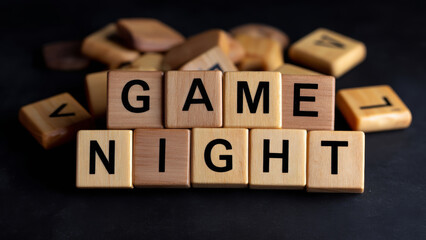 Game night with family brings joy and fun playing board games together creating memorable moments and laughter in cozy setting