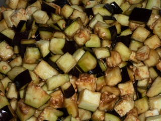 Diced Eggplant Cooking in a Pan.