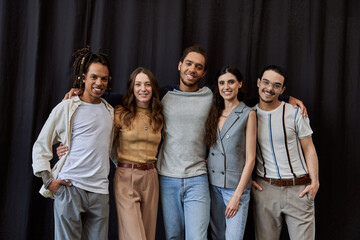 Young stylish friends showcase their unique fashion sense in a trendy urban setting during daytime