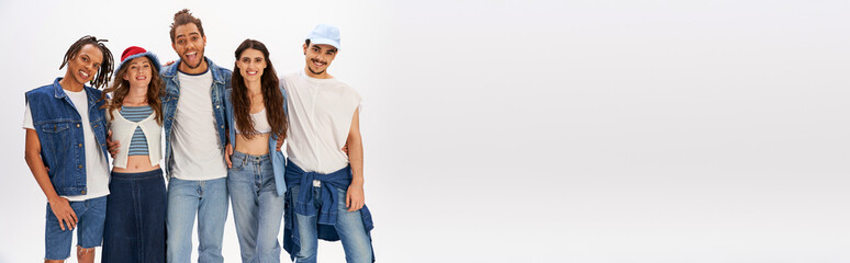 Young stylish friends celebrate creativity and fashion in a vibrant urban setting © Bliss