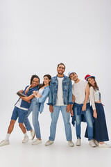 Naklejka premium Vibrant young friends showcase their unique styles in a modern and creative setting