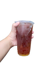 hand holding a ice tea in plastic cups on white background
