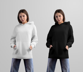 Template of white, black long hoodie oversized, on a girl in blue jeans, hands in pocket, front view, for design, branding.