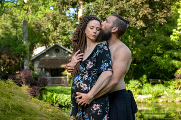 Photography of a lovely young couple expected a baby