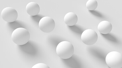 Group of white spheres rolling on gray background. Isolated. 3d illustration.