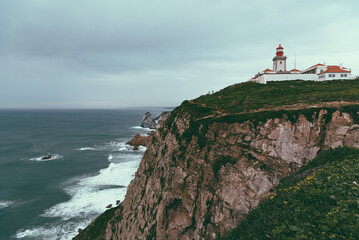Dramatic coastal cliffs with waves in Portugal