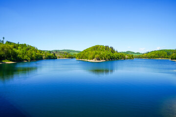 View of the Aggertalsperre Dam in the Oberbergisches Land region of North Rhine-Westphalia. A...