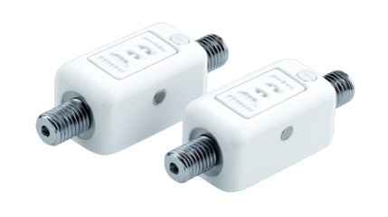 Two white rectangular devices, likely connectors, with threaded metal ends