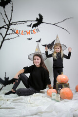 Two girls funny studio Halloween photoshoot