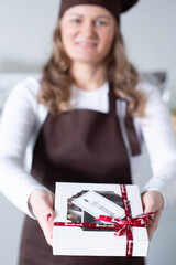 Chocolatier with homemade handmade boxes of chocolate