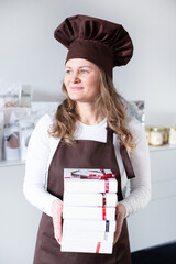 Chocolatier with homemade handmade boxes of chocolate