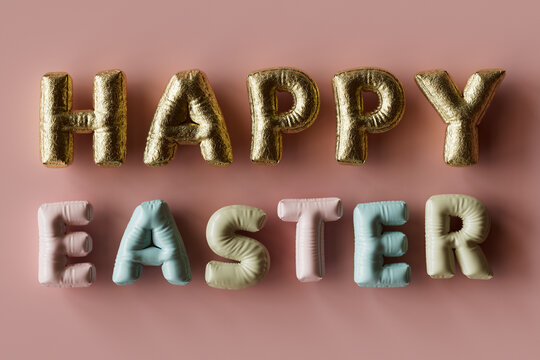 Three dimensional render of inflatable letters spelling phrase Happy Easter