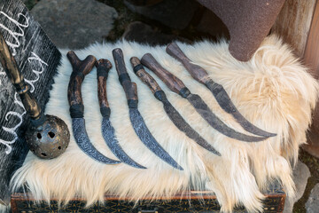 hand crafted forged knifes medieval aesthetic object product in fair retail place fantasy...