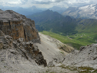 Scenic Dolomites Mountain Range With Switchback Roads in a Verdant Valley, Italy