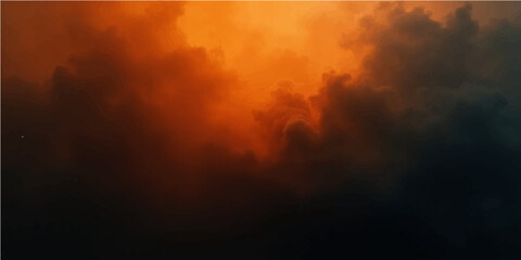 Abstract dramatic dark storm clouds and fire in the sky at sunset