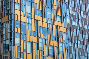 Obraz premium Modern Apartment Facade with Blue Glass
