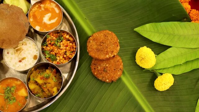 Navratri Upwas Thali  Fasting food platter on banana leaf background
