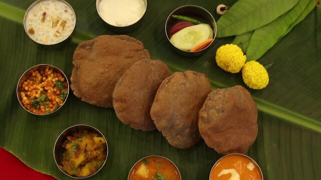 Navratri Upwas Thali  Fasting food platter on banana leaf background