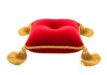 A rich, red velvet cushion, adorned with golden tassels and trim, sits against a striking black backdrop.