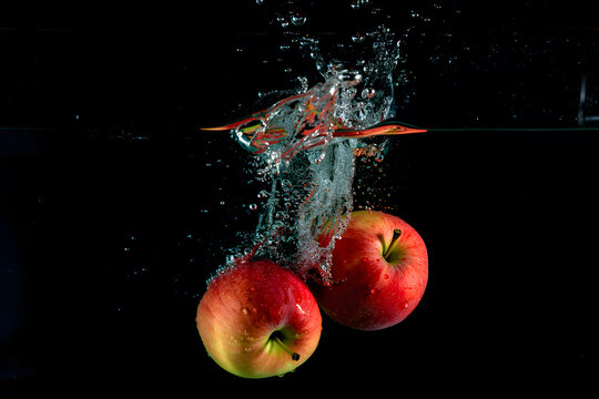 Dynamic Red Apple Splash - Fresh Fruit Underwater Photography