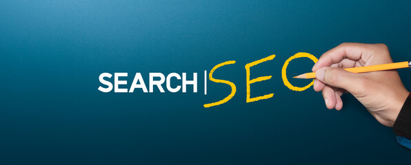 Businessman hand drawing SEO, concept. Search Engine Optimization.