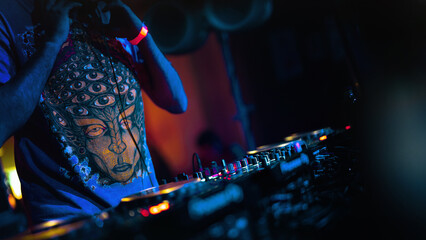 Dj behind the music board