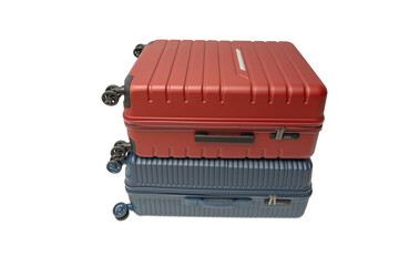 A red suitcase stacked on a blue suitcase with wheels on a transparent background in PNG format. Both are hard-shell travel luggage.