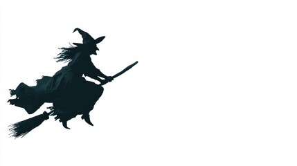 Silhouette of a mysterious witch flying on a broomstick