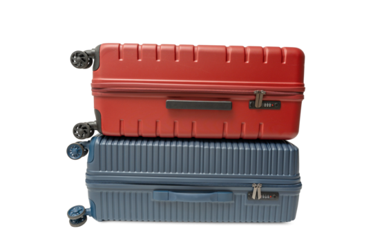 Red suitcase stacked on top of a blue suitcase on a transparent background in PNG format. Both are hard-shell travel luggage with wheels.
